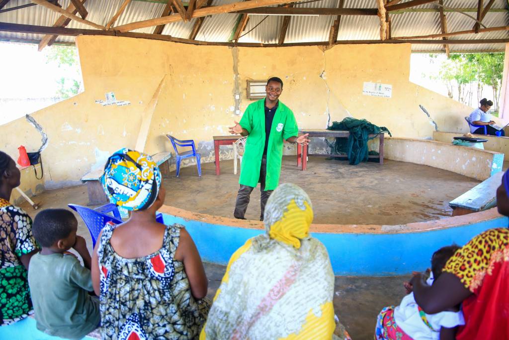 This is an image showing a Goldenstar Farming Technician Training Farmers in Kilifi, Kenya on Irrigation Systems